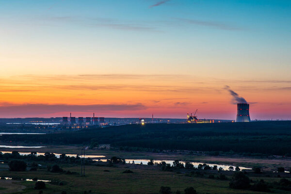 Natural landscape with Nuclear Power Plant after sunset