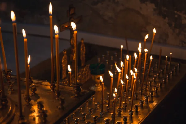 Burning candles in church or temple — Stock Photo, Image