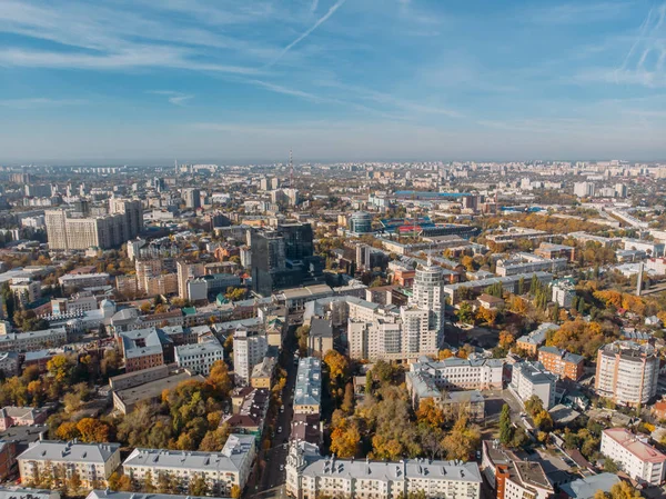 Aerial drone shot of Voronezh downtown with buildings from above, parks, streets with cars in sunny autumn day — Stock Photo, Image