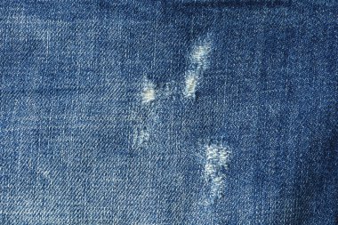 Mavi Denim Jeans doku arka plan, çizikler, makro fotoğraf ile kumaş