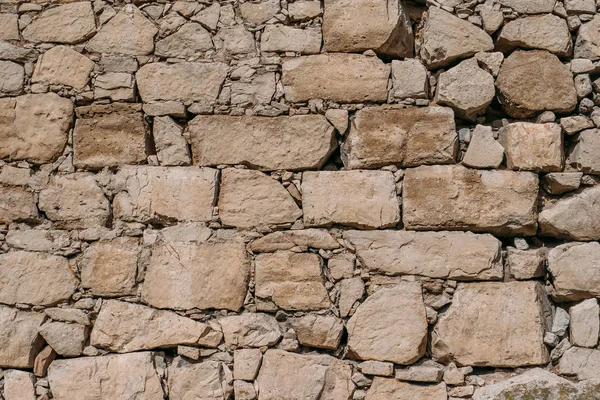 Tekstur dinding batu tua, blok permukaan kastil kuno sebagai latar belakang desain — Stok Foto