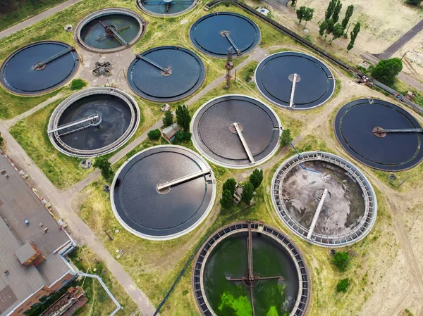 Modern urban wastewater and sewage treatment plant, aerial top view from drone