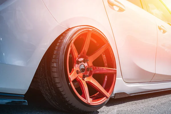 Tuned sport car wheel, close up. Low rider sport auto