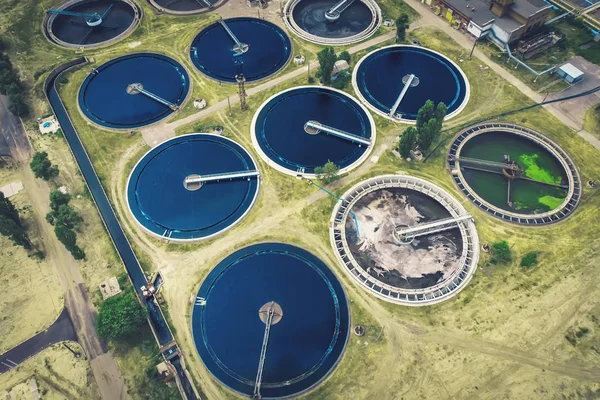 Wastewater and sewage treatment plant, aerial top view from drone