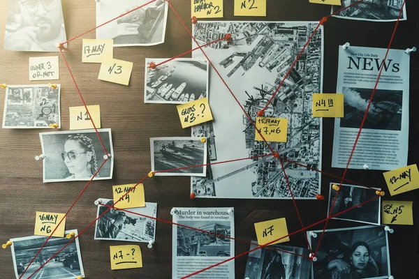 Detective board with photos of suspected criminals, crime scenes and evidence with red threads, toned