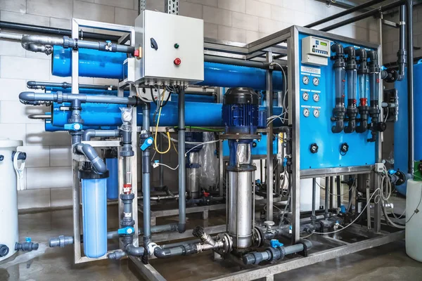 System of automatic treatment and multi-level filtration of drinking water produced from well. Plant or factory for production of purified drinking water — Stock Photo, Image