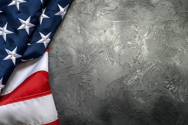 American or USA flag on concrete background with copy space for text, top view — Stock Photo, Image
