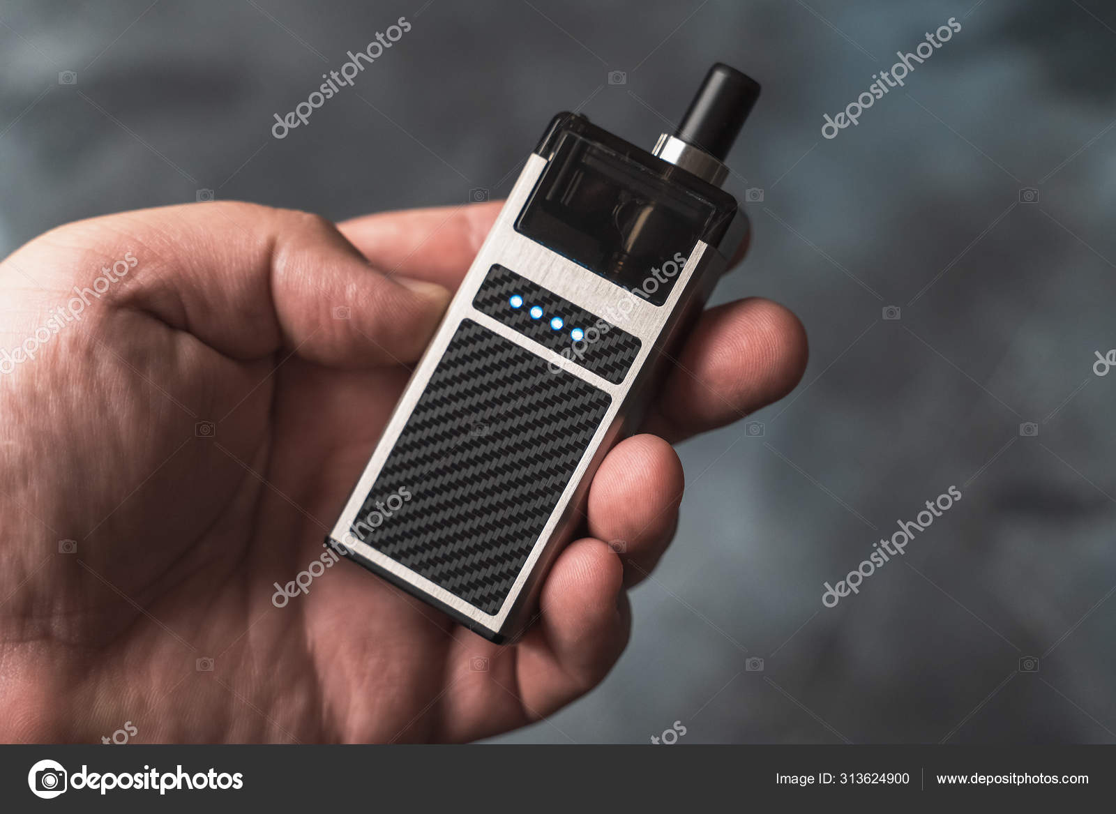 https://st4.depositphotos.com/9900404/31362/i/1600/depositphotos_313624900-stock-photo-vape-pod-in-male-hand.jpg