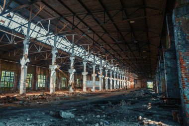 Dirty abandoned ruined industrial building inside