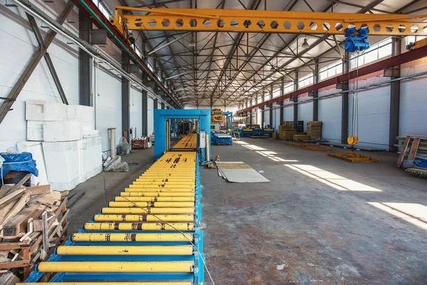 Metal work profiling factory interior inside. Machine tool conveyor for roll forming