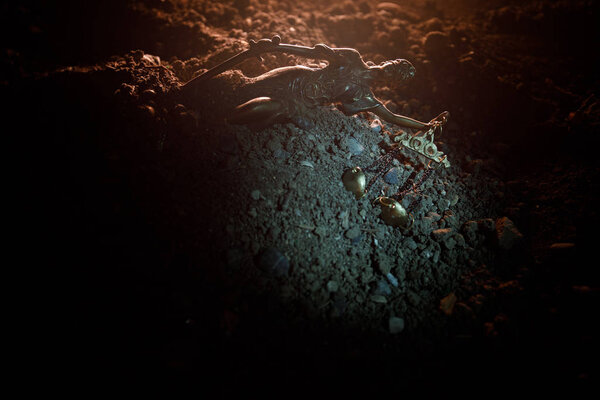 Fallen Lady Justice statue with scale in the sand. Statue of Justice lost in sand. No Justice concept. Selective focus