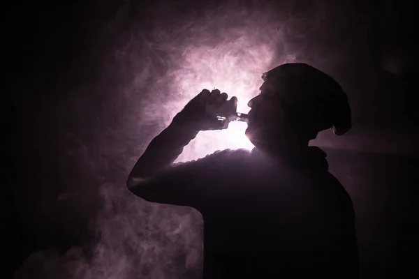Vaping Man Holding Mod Cloud Vapor Dark Foggy Toned Background — Stock Photo, Image