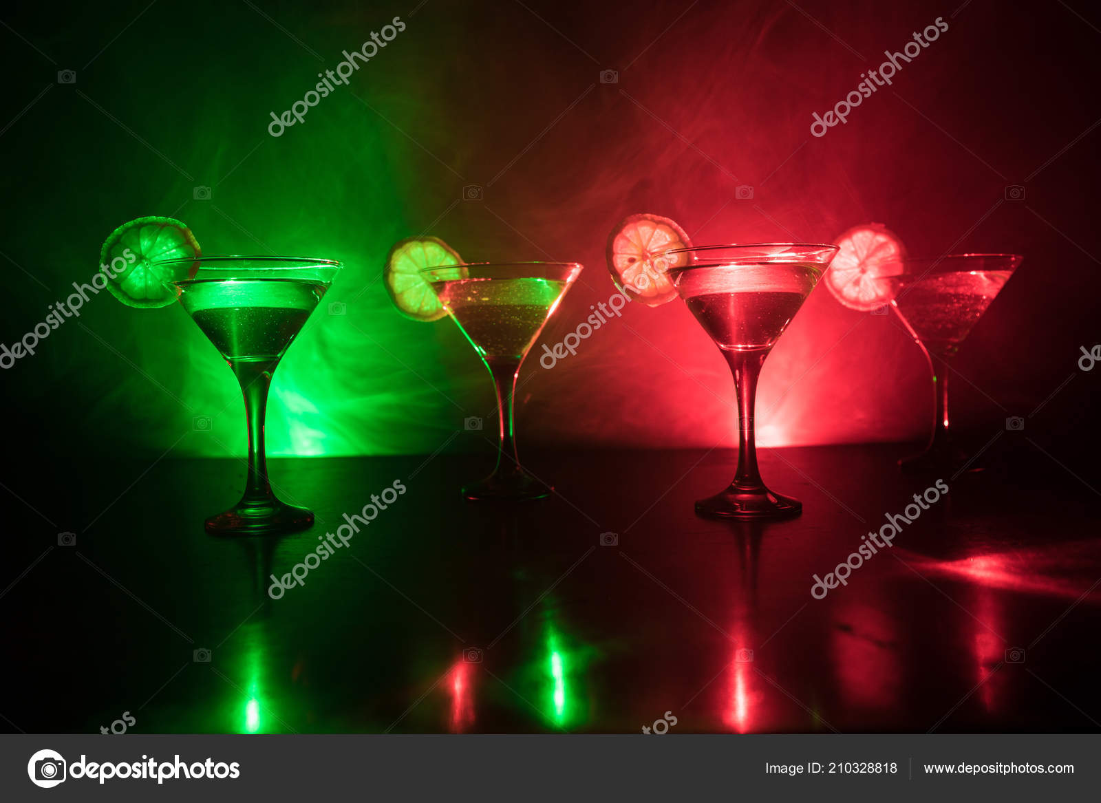 https://st4.depositphotos.com/9904426/21032/i/1600/depositphotos_210328818-stock-photo-several-glasses-famous-cocktail-martini.jpg