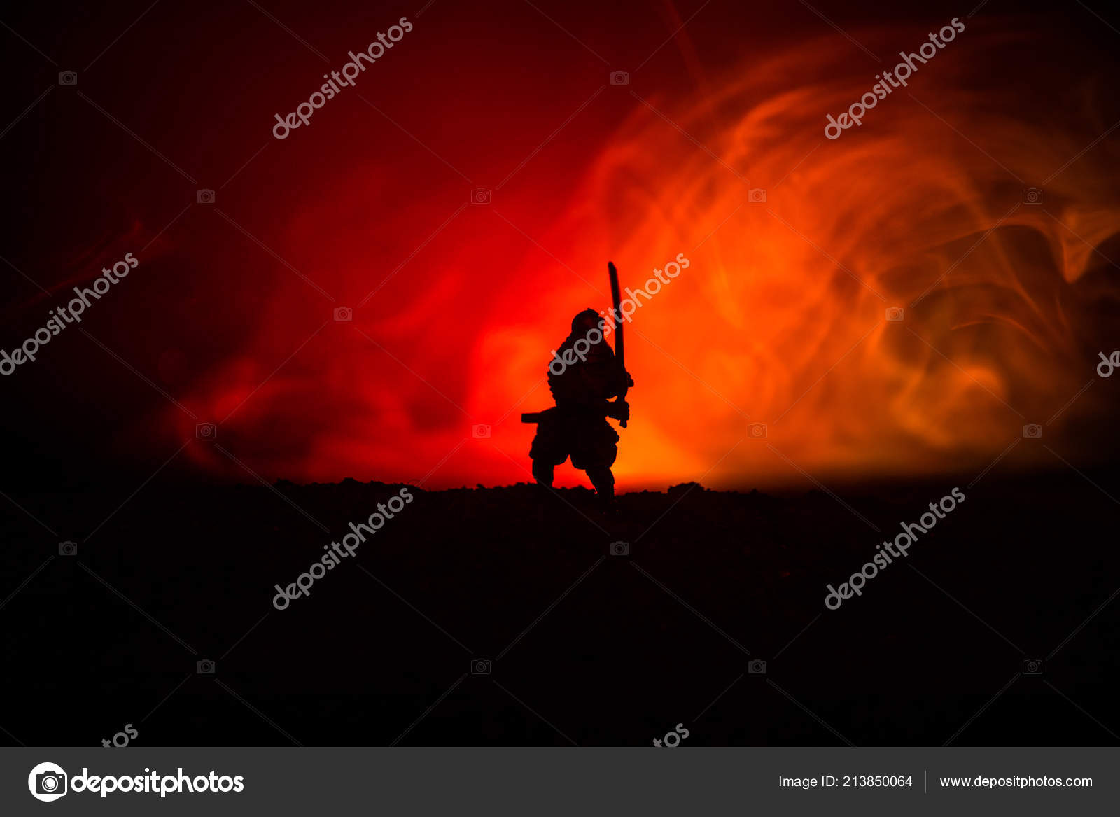 samurai fight with fire in the background