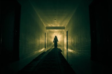 Creepy silhouette in the dark abandoned building. Horror about maniac concept or Dark corridor with cabinet doors and lights with silhouette of spooky horror person standing with different poses. clipart