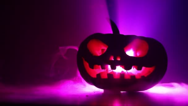 Slider Shot Scary Halloween Pumpkin Carved Eyes Smile Burning Candles — Stock Video