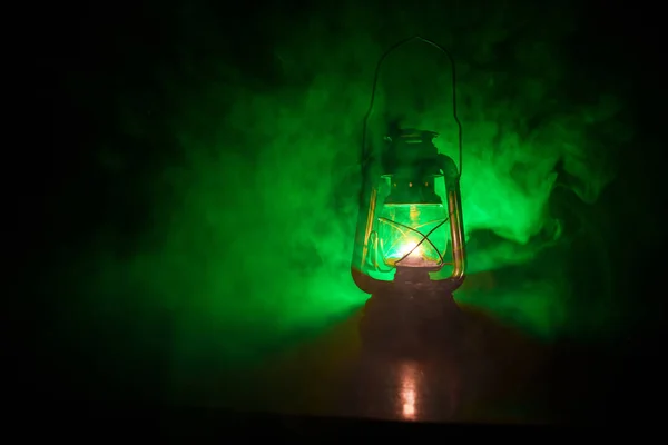 Oil Lamp Lighting up the Darkness or Burning kerosene lamp background, concept lighting