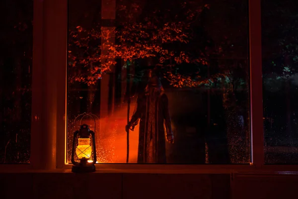 Horror Halloween Concept Burning Old Oil Lamp Standing Window Silhouette — Stock Photo, Image