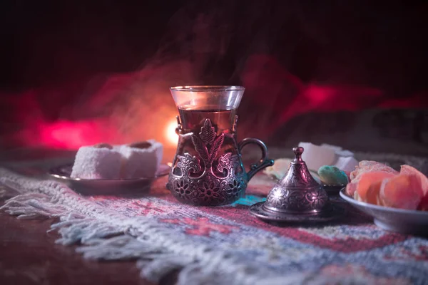 Arabian Tea Glass Eastern Snacks Carpet Dark Background Lights Smoke — Stock Photo, Image