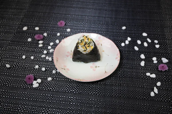 Close up view of plate with japanese food inside. Japan traditional food on table with eastern decor. Selective focus