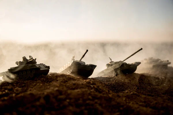 War Concept. Military silhouettes fighting scene on war fog sky background, World War Soldiers Silhouettes Below Cloudy Skyline at sunset. Attack scene. Armored vehicles. tank in action