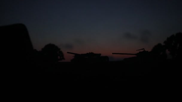 War Concept. Military silhouettes fighting scene on war fog sky background, World War Soldiers Silhouettes Below Cloudy Skyline At night. Attack scene. Armored vehicles. — Stock Video