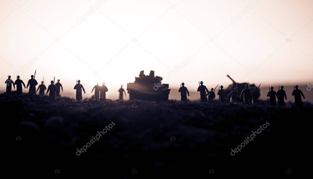 War Concept. Military silhouettes fighting scene on war fog sky background, World War Soldiers Silhouettes Below Cloudy Skyline at sunset. Attack scene. Armored vehicles. tank in action