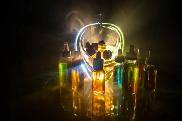 Vape Concept Smoke Clouds Vape Liquid Bottles Dark Background Light — Stock Photo, Image