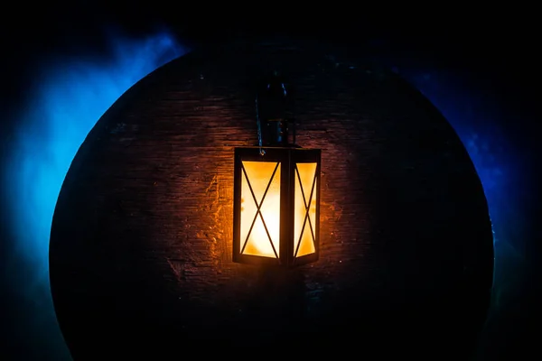 Arabic lantern with candle at night for Islamic holiday. Muslim holy month Ramadan. The end of Eid and Happy New Year. — Stock Photo, Image