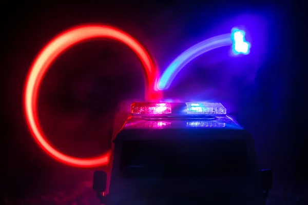 Police cars at night. Police car chasing a car at night with fog background. 911 Emergency response Selective focus — Stock Photo, Image