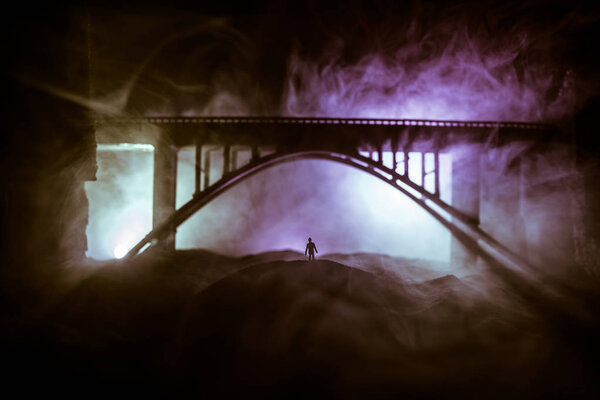 Apocalyptic ruins of the city. Disaster effect. Night scene. City destroyed by war. Destroyed skyscrapers