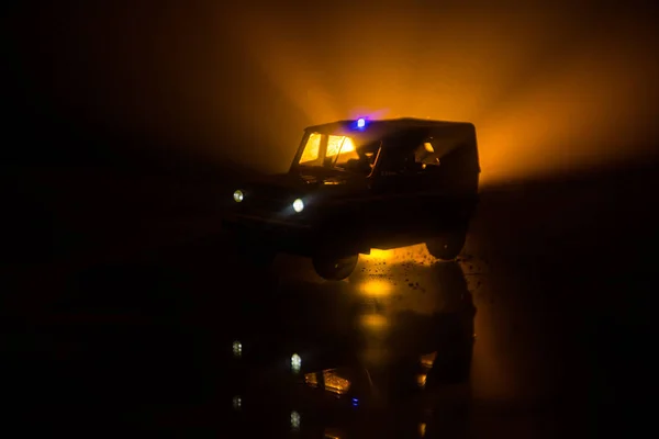 Police cars at night. Police car chasing a car at night with fog background. 911 Emergency response — Stock Photo, Image