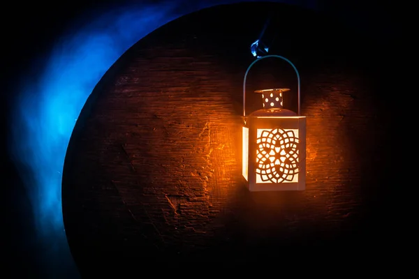 Arabic lantern with candle at night for Islamic holiday. Muslim holy month Ramadan. The end of Eid and Happy New Year. — Stock Photo, Image