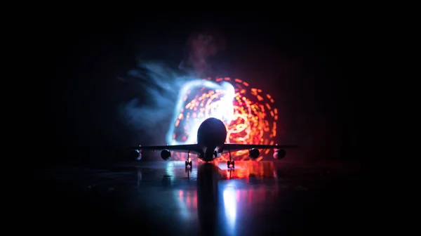 Artwork decoration. White passenger plane ready to taking off from airport runway. Silhouette of Aircraft during night time.