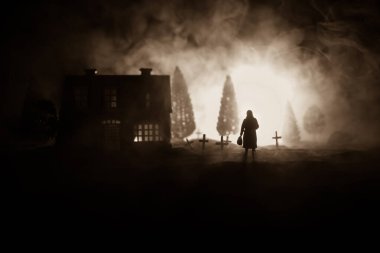 Diffuse entities walking on a street from an old European cemetery in moonlit night clipart