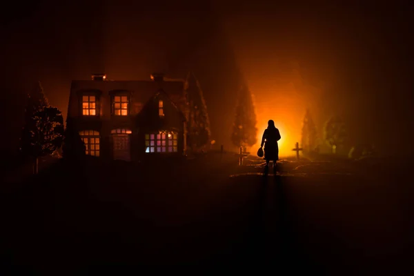 Diffuse entities walking on a street from an old European cemetery in moonlit night — Stock Photo, Image