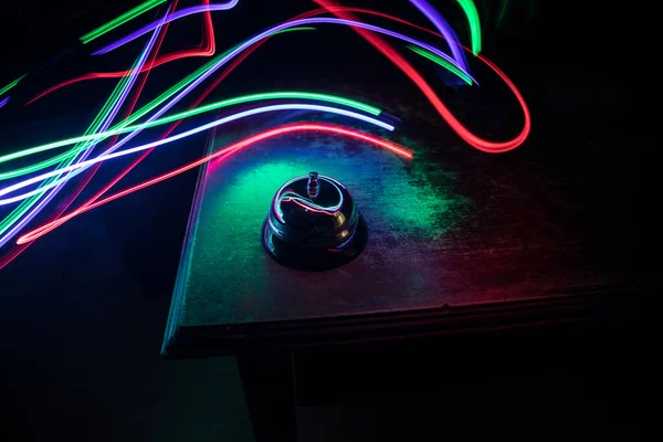 Calling Service Bell Wooden Table Toned Lights Dark Background Hotel — Stock Photo, Image