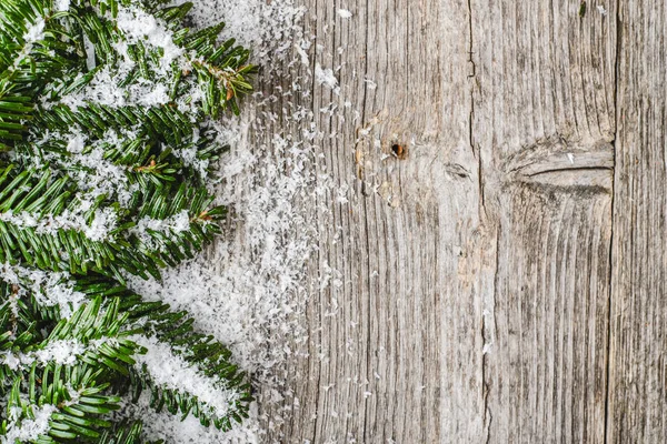 Bordo Natale Con Rami Abete Fiocchi Neve Sfondo Legno — Foto Stock
