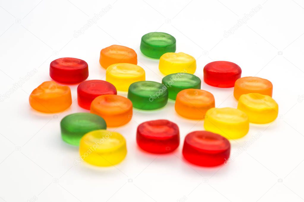 Round gummy candy isolated on white background