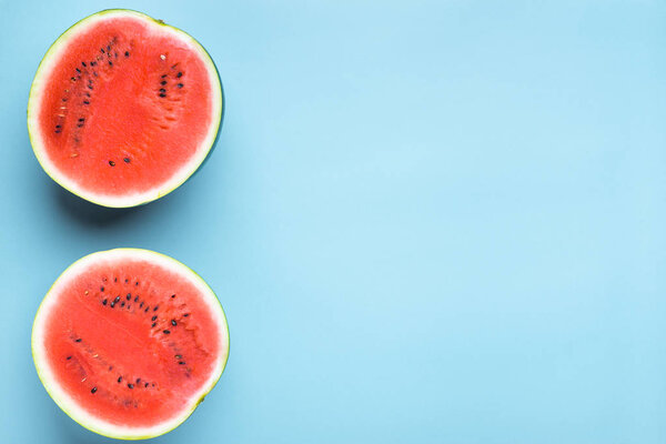 Colorful fruit background of fresh watermelon halves