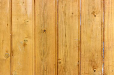 Sarı boyalı ahşap plakalar doku ile çatlak ve çizikler. Ahşap arka plan