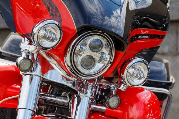 Moscow, Russia - May 04, 2019: Chrome headlights with direction indicators of Harley Davidson motorcycle closeup. Moto festival MosMotoFest 2019 — Stock Photo, Image