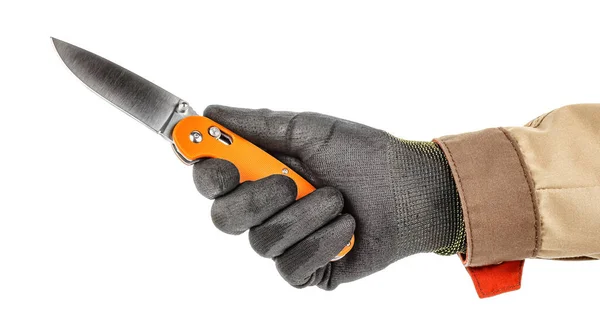 Open pocket folding knife with bright orange handle in worker hand in black protective glove and brown uniform isolated on white background