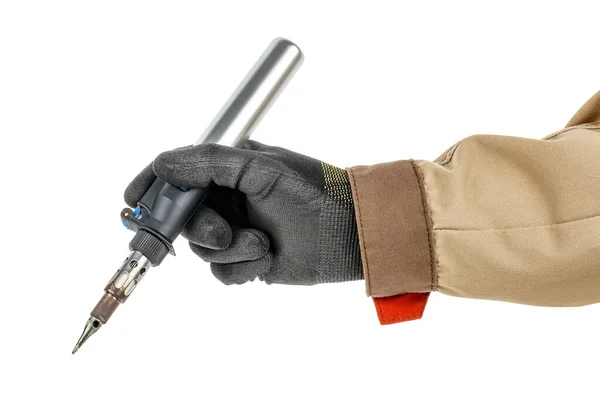 Electrician hand in black protective glove and brown uniform holding modern gas soldering iron isolated on white background
