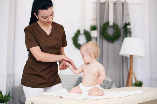 Professional Female Masseuse Makes Massage Little Baby Children Massage Couch — Stock Photo, Image