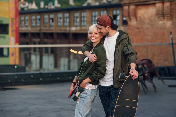 Young Charming Couple Love Walking Skateboards Roof Industrial Building Sunset — Stock Photo, Image