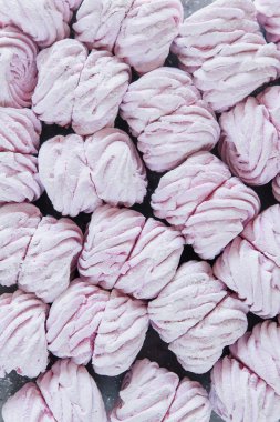 Arka plan olarak pembe el yapımı marshmallow bir sürü. Doğal marshmallow