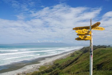 direction and  distance post in McCrackens Rest in New Zealand taken on 4 November 2017 clipart