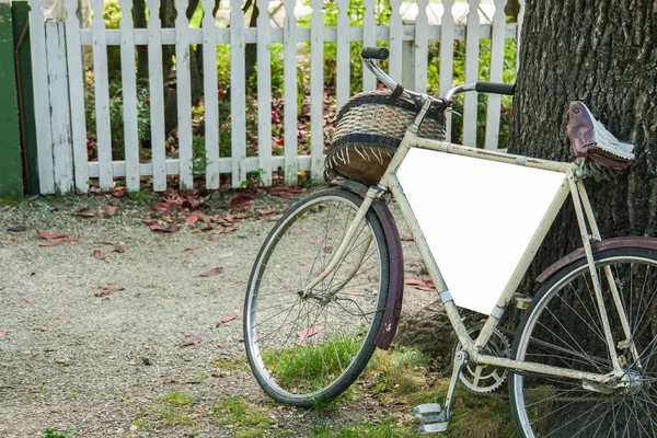 vintage bicycle at art gallery for decoration with mock up banner for text