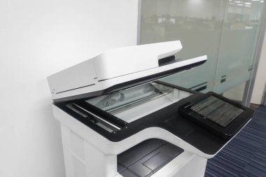 standing multifunctional printer in office for employee to print, scan and copy business documents clipart